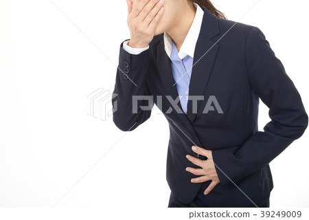 A woman complaining of abdominal pain A woman complaining of abdominal pain 39249009