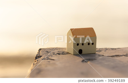 Small house on grunge floor with nature background Small house on grunge floor with nature background 39249189