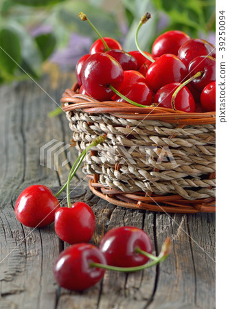 ripe sweet cherries in a basket 39250094