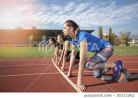 Women ready to race on track field 39251862