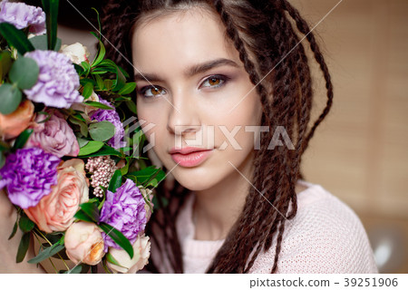 Close-up Beautiful woman with dreadlocks hairstyle Close-up Beautiful woman with dreadlocks hairstyle 39251906