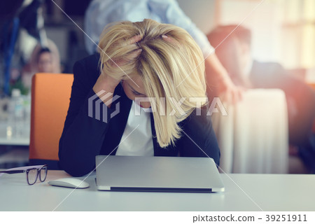 Feeling tired and stressed. Frustrated adult woman Feeling tired and stressed. Frustrated adult woman 39251911