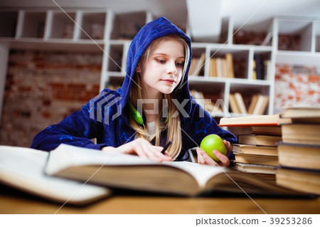 Teenage girl in a library 39253286
