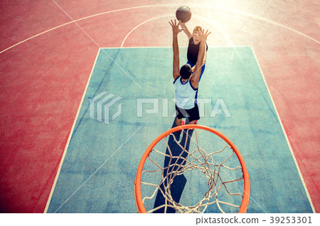 High angle view of basketball player dunking 39253301