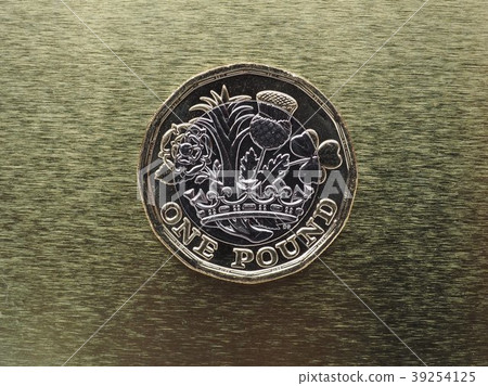 1 pound coin, United Kingdom over gold 1 pound coin, United Kingdom over gold 39254125