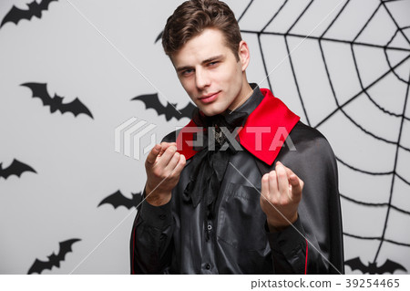 Vampire Halloween Concept - Portrait of handsome Vampire Halloween Concept - Portrait of handsome 39254465