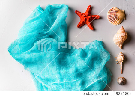 Seashells, starfish and cian cloth on white 39255803