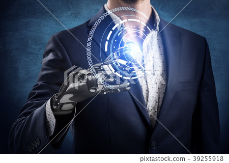 Businessman with robot hand touches virtual icon 39255918