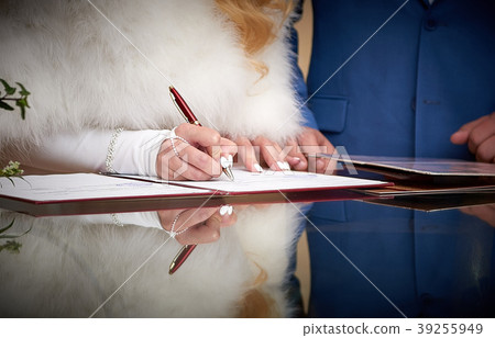 Groom and bride register marriage close up 39255949