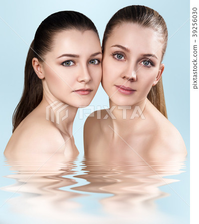Two beautiful women in water. Spa concept. 39256030