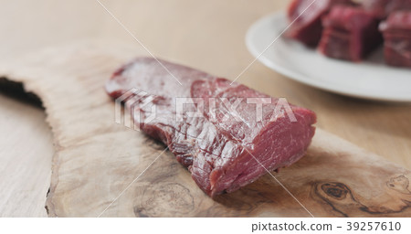 raw beef fillet for steak on wooden board 39257610