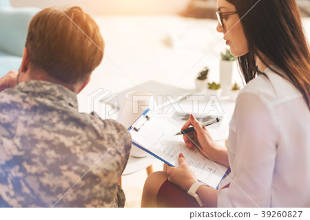 Attentive brunette female thinking how to help her Attentive brunette female thinking how to help her 39260827
