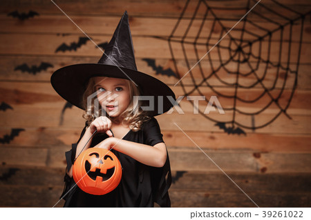 Halloween Witch concept - little caucasian witch Halloween Witch concept - little caucasian witch 39261022