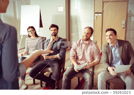 Happy nice people looking at their training Happy nice people looking at their training 39261023