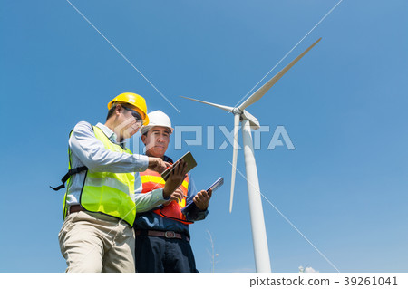 Engineer and Architect discuss over Tablet Engineer and Architect discuss over Tablet 39261041