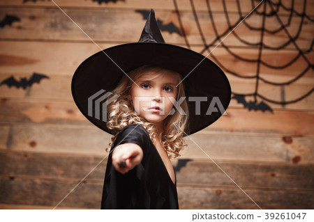 Halloween Witch concept - little witch child enjoy Halloween Witch concept - little witch child enjoy 39261047