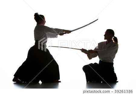 Man and woman fighting and training aikido on Man and woman fighting and training aikido on 39261386