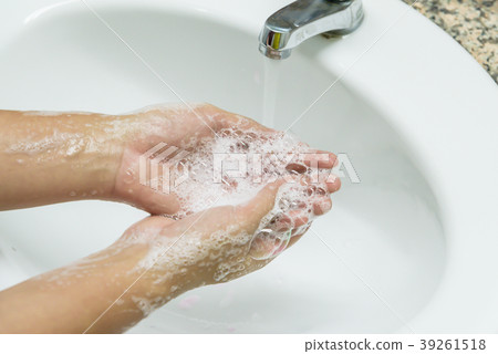 Selective focus of woman washing hands with soap Selective focus of woman washing hands with soap 39261518