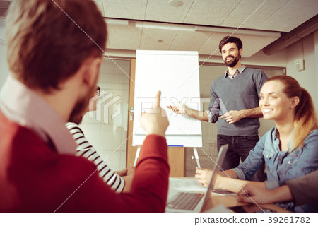 Joyful handsome man explaining his idea 39261782