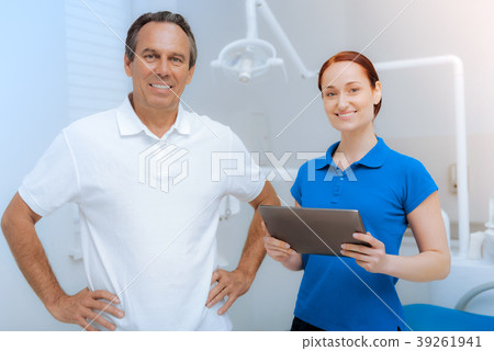 Positive nice intern holding a tablet Positive nice intern holding a tablet 39261941