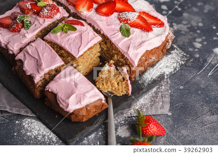 Yogurt pound cake for breakfast with pink glaze 39262903