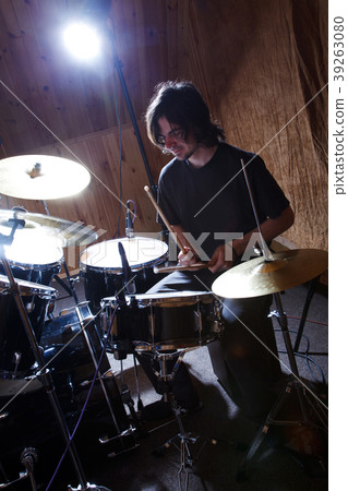 Rock and roll drummer 39263080