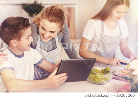 Lovely female embracing her child Lovely female embracing her child 39263260