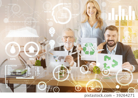 Positive coworkers feeling happy while showing 39264271