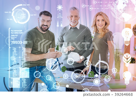 Positive emotional engineers smiling and looking 39264668