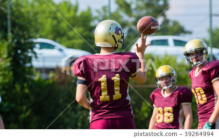 Pass at American Football game on field Pass at American Football game on field 39264994