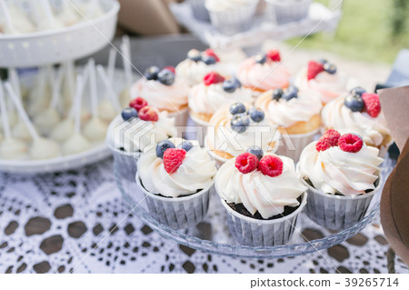 Set of different delicious tasty muffins with 39265714
