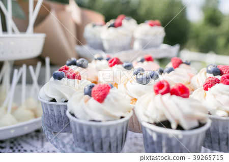 Set of different delicious tasty muffins with 39265715