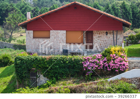 A new house with a garden in a rural  39266337