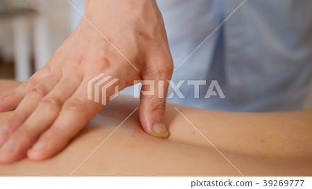 Young model woman model receiving massage at spa - 39269777