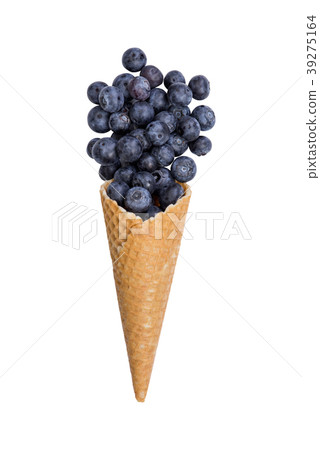 Waffle ice cream cone with fresh blueberry fruits Waffle ice cream cone with fresh blueberry fruits 39275164