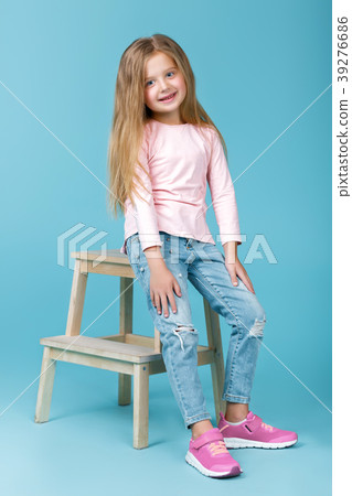 little girl in pink sweater little girl in pink sweater 39276686