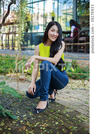 portrait of beautiful asian woman in garden portrait of beautiful asian woman in garden 39276933