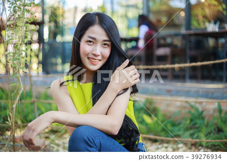portrait of beautiful asian woman in garden 39276934