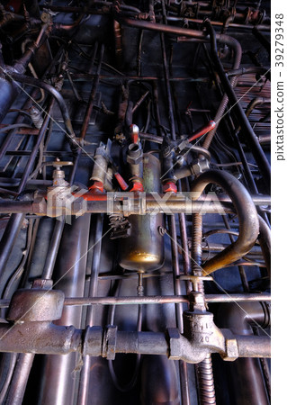 Dark industrial interior with metal rusty pipes 39279348