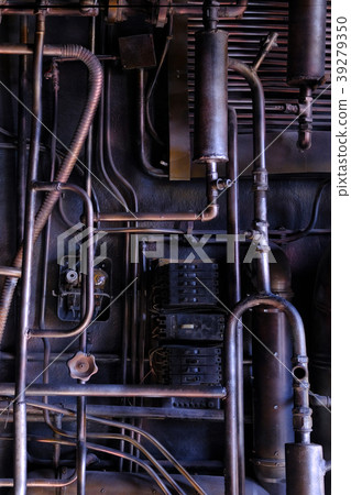 Dark industrial interior with metal rusty pipes Dark industrial interior with metal rusty pipes 39279350