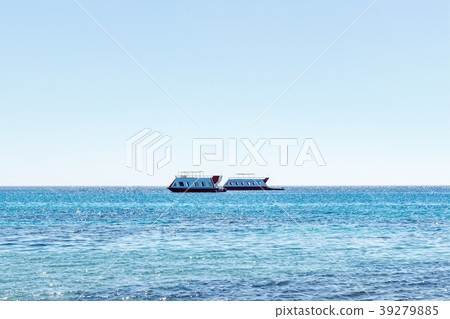 The ship sails on the sea. tourist boat. Sea ships The ship sails on the sea. tourist boat. Sea ships 39279885