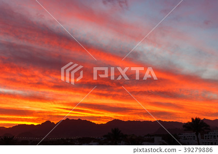 Colorful orange sunset over the mountain hills 39279886
