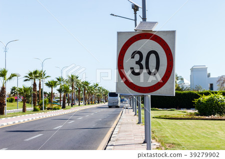 Speed limit sign with solar panel in the road Speed limit sign with solar panel in the road 39279902