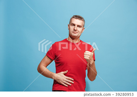 The happy businessman standing and smiling against 39280953