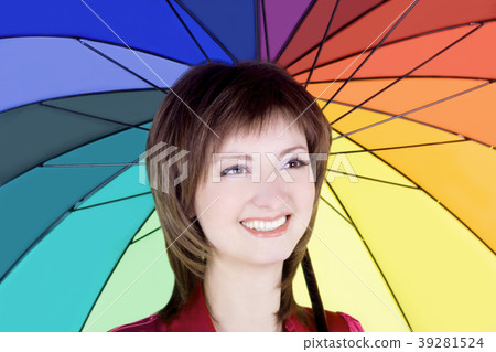 Lovely young lady standing with color umbrella Lovely young lady standing with color umbrella 39281524