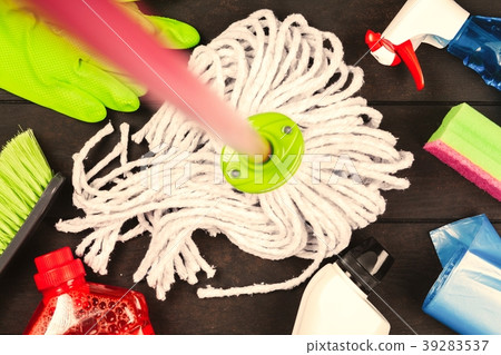 Cleaning supplies on wooden background Cleaning supplies on wooden background 39283537