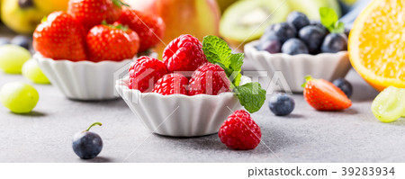 Fresh assorted fruits and berries 39283934