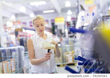 Young independent woman buying tools for house 39284361