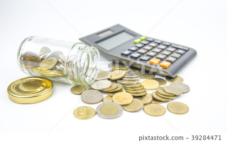 Saving money into bottle  39284471