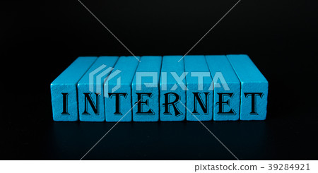 Word on wood block in black background. Word on wood block in black background. 39284921
